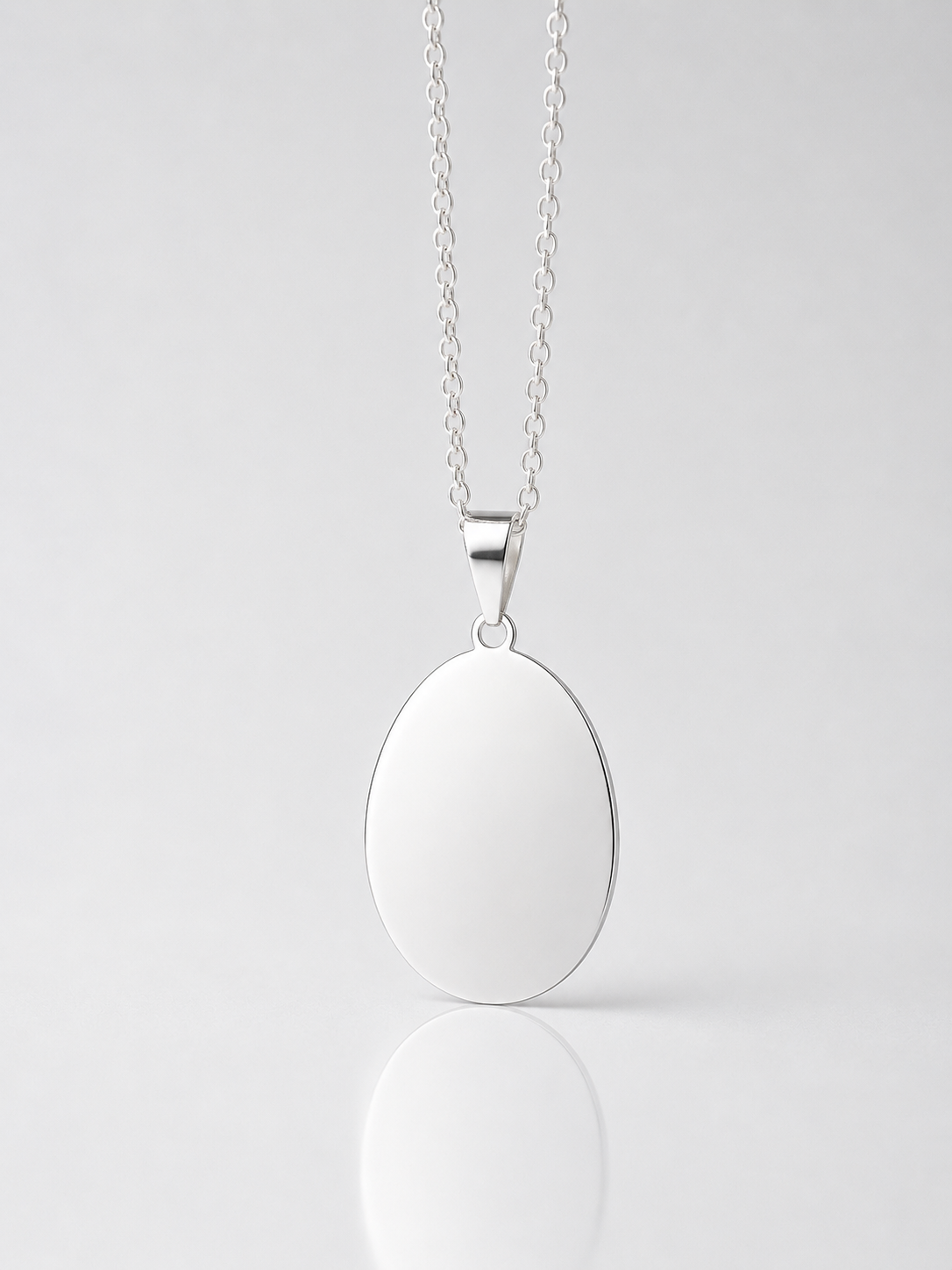 Placa Ovalada Personalizable 24 x 16 mm en Plata 925 Italiana.